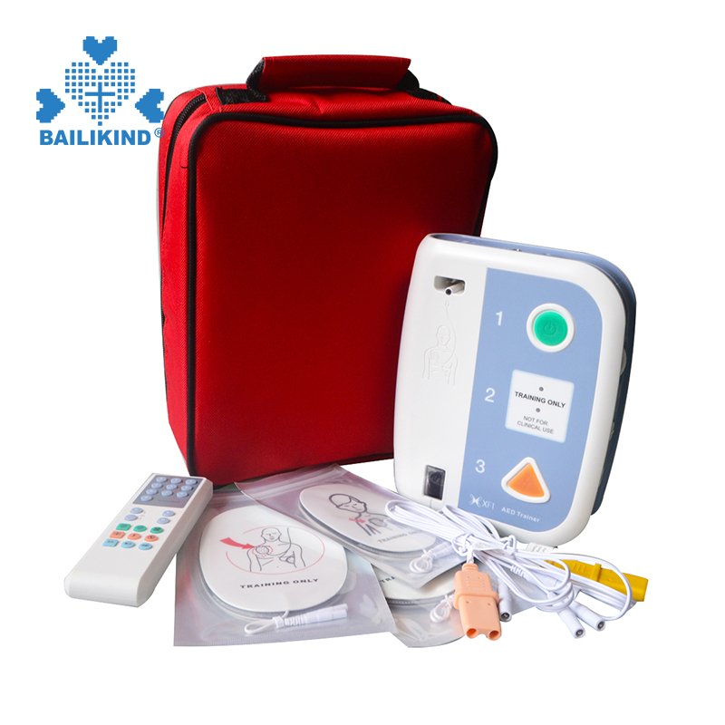 Bii o ṣe le lo Olukọni AED adaṣe adaṣe Defibrillator Ikẹẹkọ Ikẹkọ Iranlọwọ Akọkọ Fun Awọn irinṣẹ Olukọni Meji ti Ile-iwe CPR